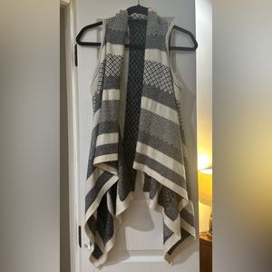 a.n.a. sweater vest. Size S. Gently worn. No stains or tears. Smoke free home.